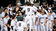 The Vanderbilt bench celebrates a home run by Vanderbilt's Brodie Johnston (9) during a college baseball game between Tennessee and Vanderbilt at Lindsey Nelson Stadium in Knoxville, Tenn., on May 9, 2025.