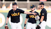 Tennessee's Liam Doyle (12) points to second base as he and the infielders plead for a review for a potential double play during a college baseball game between Tennessee and Vanderbilt at Lindsey Nelson Stadium in Knoxville, Tenn., on May 9, 2025.