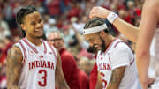 Indiana's Lamar Wilkerson (3) and Tayton Conerway (6) share a laugh after Wilkerson checked out for the final time during the Indiana versus Penn State men's basketball game at Simon Skjodt Assembly Hall on Tuesday, Dec. 9, 2025.