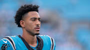 Oct 12, 2025; Charlotte, North Carolina, USA; Carolina Panthers quarterback Bryce Young (9) looks on before the game against the Dallas Cowboys at Bank of America Stadium. 
