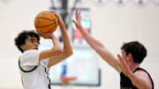 Rider Portela of Sunnyslope (Phoenix), takes a jump shot in front of a De La Salle defender during the 27th MLK Classic. The Vikings have probably played the toughest schedule in Arizona and should compete in the Open Division despite a 17-8 record. 