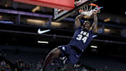 Mahamadou Diop finishes a two-handed dunk during the California (CIF) State Division 3 championship game at Golden 1 Center in Sacramento.