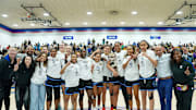 IMG Academy players and coaches pose after winning the 2025 Chipotle Nationals championship game in Indiana.