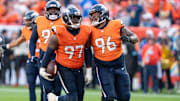 October 13, 2024: Denver Broncos defensive tackle Malcolm Roach (97) celebrates his fumble recovery with teammate Denver Broncos defensive end Eyioma Uwazurike (96) in the second half of the football game between the Denver Broncos and Los Angeles Chargers. The play was wiped out by a defensive holding call. 