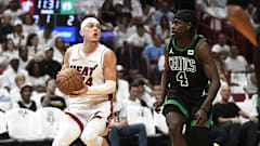 Apr 29, 2024; Miami, Florida, USA; Miami Heat guard Tyler Herro (14) looks for a shot against Boston