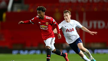 A young Angel Gomes and a young Oliver Skipp lock horns during U21 football a few years ago