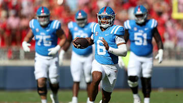 Trinidad Chambliss running the ball for Ole Miss