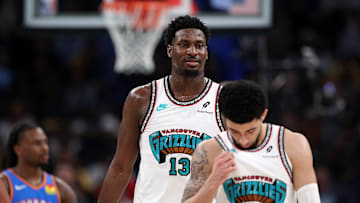 April 24, 2025; Memphis, Tennessee, USA; Jaren Jackson Jr. (13) and Scotty Pippen Jr. (1) pictured in the Grizzlies' Game 3 loss against the Oklahoma City Thunder. 