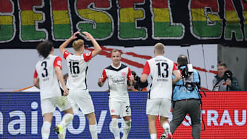 Mario Götze (27) accepts congratulations from his Eintracht Frankfurt teammates during their win over Stuttgart.