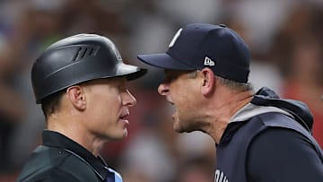 New York Yankees manager Aaron Boone screams at umpire Brian Walsh