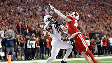 Nicholas Singleton hauls in a one-handed grab against Wisconsin.