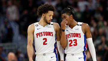 Pistons' guards Cade Cunningham (left) and Jaden Ivey (right) pictured versus Milwaukee
