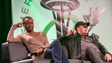 Danai Gurira and Michael Rooker look about as friendly toward each other as their characters, Michonne and Merle, on The Walking Dead 