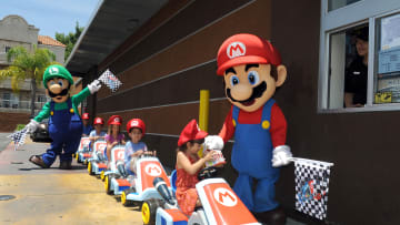 Mario and Luigi Celebrate the Release of Mario Kart 8 At McDonald's