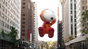 Snoopy floats above the 2022 Macy's Thanksgiving Day Parade.