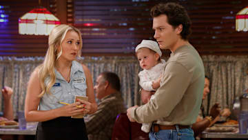 “A Regular Samaritan” – Georgie joins a church to sell tires to the congregation and Mandy worries there is more to it than that, on GEORGIE & MANDY’S FIRST MARRIAGE, Thursday, Dec. 5 (8:00-8:31 PM, ET/PT) on the CBS Television Network, and streaming on Paramount+ (live and on-demand for Paramount+ with SHOWTIME subscribers, or on-demand for Paramount+ Essential subscribers the day after the episode airs)*. Pictured (L-R): Emily Osment as Mandy and Montana Jordan as Georgie 