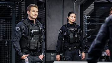 "Miracle" -- Hondo and the SWAT team are forced to work over their Christmas vacation when a drug cartel is out for blood after their cache of gold bars is stolen. Also, Jessica draws the attention of Michael Plank (Peter Facinelli), president of the Police Commission, when she approaches him with her ideas on how to improve the SWAT division, on S.W.A.T., Thursday, Dec. 21 (10:00-11:00, ET/PT) on the CBS Television Network. Pictured left to right: Alex Russell as Jim street, and Lina Esco as