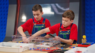 LEGO MASTERS JR: L-R: Contestants Ajay and Zak in the LEGO MASTERS JR episode "Celebrity Stunt Doubles" airing Monday, August 25 (8:00-9:02 PM ET/PT) on FOX. CR: Tom Griscom/FOX. ©2025 FOX MEDIA LLC.