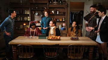 “Planes, Shanes and Automobiles” – Pictured (L-R): Ben Feldman as Kyle, Danielle Pinnock as Alberta, Rebecca Wisocky as Hetty, Brandon Scott Jones as Isaac, Román Zaragoza as Sasappis, Devan Chandler Long as Thorfinn, and Asher Grodman as Trevor. Photo: Bertrand Calmeau/CBS ©2025 CBS Broadcasting, Inc. All Rights Reserved.