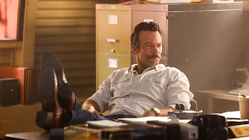 "Enter Sandman" -- Coverage of the CBS Original Series NCIS: ORIGINS, scheduled to air on the CBS Television Network. Pictured: Kyle Schmid as Mike Franks. Photo: Sonja Flemming/CBS ©2024 CBS Broadcasting, Inc. All Rights Reserved.