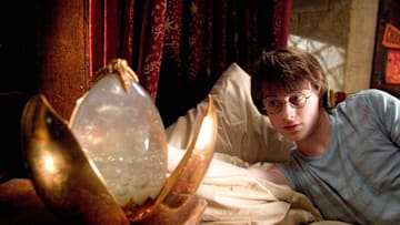 Daniel Radcliffe in Harry Potter and the Goblet of Fire, contemplating the mermaid's song. (Courtesy of Fathom Entertainment)