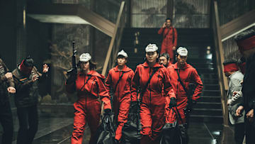 Money Heist Korea: JEA (L to R) Jun Jong-seo as Tokyo, Lee Hyun-woo as Rio, Jang Yoon-ju as Nairobi, Park Hae-soo as Berlin, Lee Won-jong as Moscow and Kim Ji-hun as Denver in episode # 1 of Money Heist Korea: JEA. Cr. Jung Jaegu/Netflix © 2021