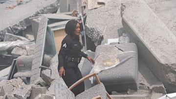 9-1-1 - “Seismic Shifts” - The 118, still reeling from their recent loss, is dispatched to a mass casualty event after a high-rise apartment building collapses. Then, Athena and Chimney have to work together to save a familiar face.THURSDAY, MAY 15 (8:00-9:00 p.m. EDT) on ABC. (Disney/Christopher Willard) 
ANGELA BASSETT