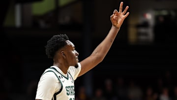 Dec 4, 2024; Minneapolis, Minnesota, USA; Michigan State Spartans forward Xavier Booker (34) celebrates his three-point basket against the Minnesota Golden Gophers during the second half at Williams Arena. Mandatory Credit: Matt Krohn-Imagn Images