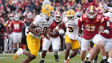 Arizona State Sun Devils quarterback Jeff Sims (2) runs with the ball as Iowa State Cyclones' linebacker Will McLaughlin (23) rushes to tackle during the first quarter in the Big-12 showdown at jack Trice Stadium on Nov. 1, 2025, in Ames, Iowa.