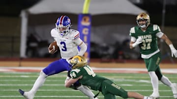 St. Bonaventure's Dylan Dunst tackles Folsom quarterback Ryder Lyons during the fourth quarter of the CIF-State Division 1-A state championship bowl at Saddleback College in Mission Viejo on Saturday, Dec. 9, 2023. St. Bonaventure lost 20-14.