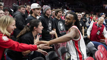 Jan 20, 2024; Columbus, Ohio, USA; Ohio State Buckeyes guard Bruce Thornton (2) high fives fans following the NCAA men’s basketball game against the Penn State Nittany Lions at Value City Arena. Ohio State won 79-67.