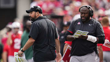 Sep 16, 2023; Columbus, Ohio, USA; Ohio State Buckeyes head coach Ryan Day and running backs coach Tony Alford watch from the sideline during the NCAA football game against the Western Kentucky Hilltoppers at Ohio Stadium. Ohio State won 63-10.