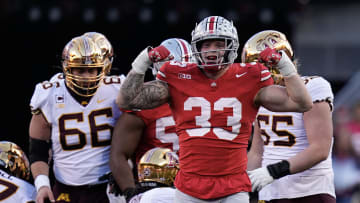 Nov 18, 2023; Columbus, Ohio, USA; Ohio State Buckeyes defensive end Jack Sawyer (33) celebrates a tackle during the first half of the NCAA football game against the Minnesota Golden Gophers at Ohio Stadium.