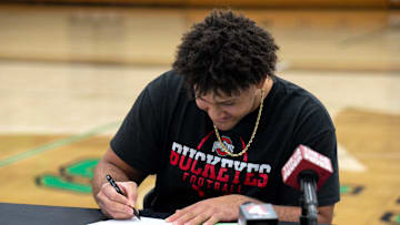 Dec 21, 2022; Dublin, Ohio, United States; Will Smith Jr. signs a letter of intent to play football with Ohio State University during a signing ceremony at Rock Arena at Dublin Coffman High School. Mandatory Credit: Joseph Scheller-The Columbus Dispatch

Football Will Smith Signing Day Ceremony