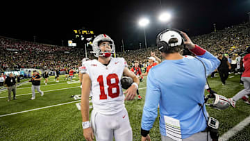 Ohio State quarterback Will Howard (18) walks off the field after the Buckeyes fell to Oregon 32-31 at Autzen Stadium.