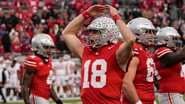 Ohio State Buckeyes quarterback Will Howard (18) celebrates during the second half of the NCAA football game against the Indiana Hoosiers at Ohio Stadium in Columbus on Saturday, Nov. 23, 2024. Ohio State won 38-15.