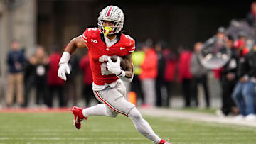 Ohio State Buckeyes wide receiver Emeka Egbuka (2) runs after making a catch during the NCAA football game against the Indiana Hoosiers at Ohio Stadium in Columbus on Monday, Nov. 25, 2024. Ohio State won 38-15.