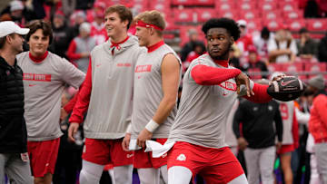Ohio State Buckeyes quarterback Air Noland (12) warms up prior to the NCAA football game against the Indiana Hoosiers at Ohio Stadium in Columbus on Saturday, Nov. 23, 2024.