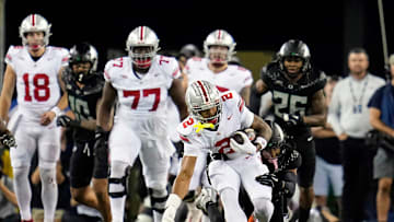 Oct 12, 2024; Eugene, Oregon, USA; Ohio State Buckeyes wide receiver Emeka Egbuka (2) gets tackled by Oregon Ducks defensive back Brandon Johnson (3) after a catch in the second half during the NCAA football game at Autzen Stadium