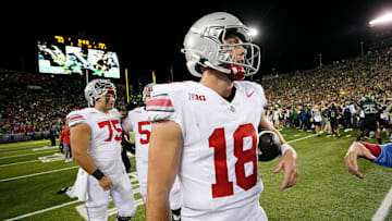 Oct 12, 2024; Eugene, Oregon, USA; Ohio State Buckeyes quarterback Will Howard (18) walks off the field after losing 32-31 to Oregon Ducks during the NCAA football game at Autzen Stadium.
