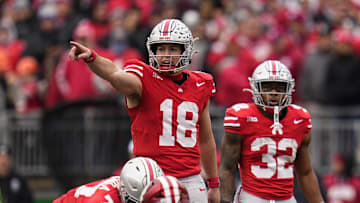 Ohio State Buckeyes quarterback Will Howard (18) signals to his offense during the second half of the NCAA football game against the Indiana Hoosiers at Ohio Stadium in Columbus on Saturday, Nov. 23, 2024. Ohio State won 38-15.