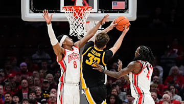 Ohio State Buckeyes guard Micah Parrish (8) defends Iowa Hawkeyes forward Owen Freeman (32) during the first half of the NCAA men's basketball game at Value City Arena on Jan. 27, 2025.