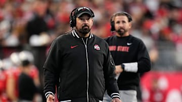 Nov 18, 2023; Columbus, Ohio, USA; Ohio State Buckeyes head coach Ryan Day and offensive coordinator Brian Hartline look at a replay during the NCAA football game against the Minnesota Golden Gophers at Ohio Stadium.