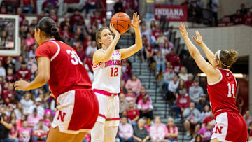 Indiana's Yarden Garzon (12) makes a three pointer over Nebraska's Callin Hake (14) during the Indiana versus Nebraska women's basketball game at Simon Skjodt Assembly Hall on Sunday, Feb. 2, 2025.