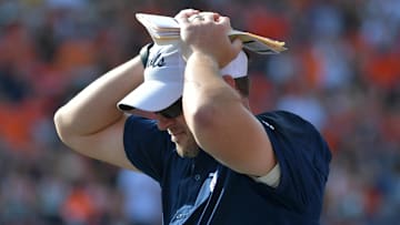 Florida Atlantic coach Tom Herman seems confused by the post-game exchange with USF coach Alex Golesh Credit: Ron Johnson-Imagn Images