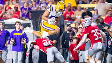 Tight end Mason Taylor 86 leaps over defenders as the LSU Tigers take on the Nicholls Colonels at Tiger Stadium in Baton Rouge, LA. Saturday, Sept. 7, 2024.