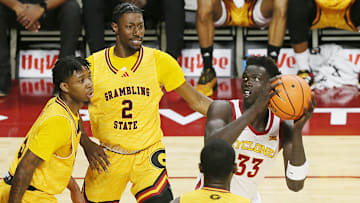 Iowa State Cyclones forward Omaha Biliew (33) looks for a shot around Grambling State defenders.