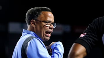Liberty head men's basketball coach Ritchie McKay talks with the referee during a break in the Mens’ Basketball game against Middle Tennessee at MTSU, on Thursday, March 6, 2025.