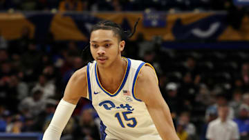 Mar 8, 2025; Pittsburgh, Pennsylvania, USA;  Pittsburgh Panthers guard Jaland Lowe (15) dribbles the ball against the Boston College Eagles during the second half at the Petersen Events Center. Mandatory Credit: Charles LeClaire-Imagn Images