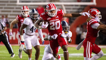 Dre'lyn Washington (20) runs the ball as the Louisiana Ragin' Cajuns take on the Georgia Southern Eagles Thursday, Nov. 10, 2022

Louisiana Vs Georgia Southern 11 10 22